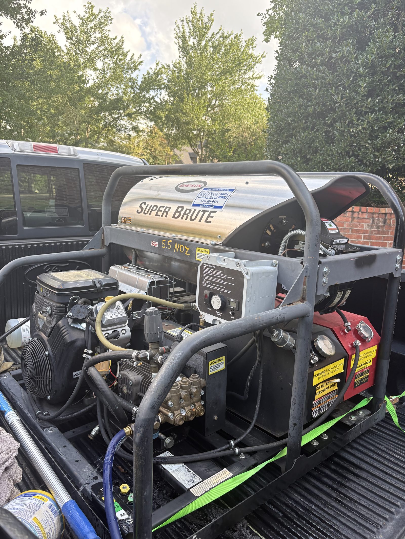Simpson Super Brute commercial hot-water rig in the bed of Iron Jet's truck
